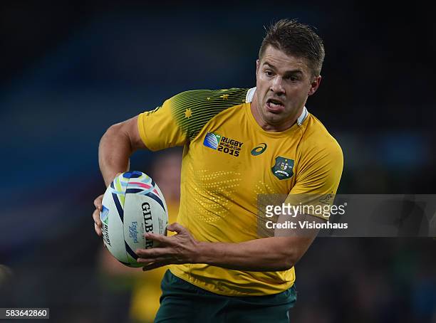 Drew Mitchell of Australia makes a break before setting up Adam Ashley-Cooper for the final try during the Rugby World Cup 2015 Semi-Final match...