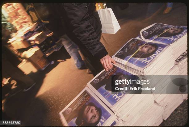 New York City: New Yorkers snatch up the first copies of this week's Village Voice.