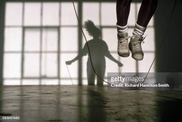 woman jumping rope - jump rope bildbanksfoton och bilder