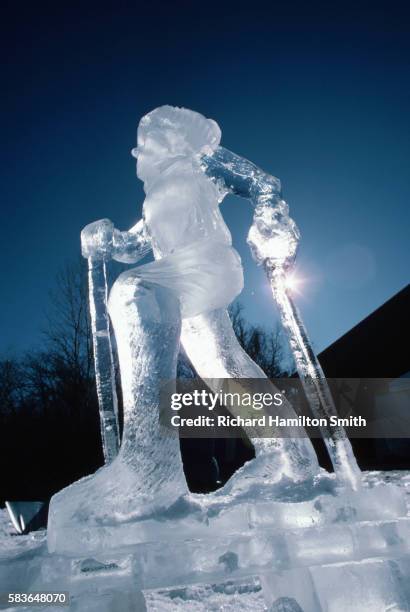 ice sculpture of skier - ice sculpture stock-fotos und bilder