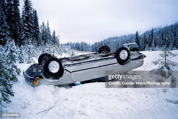 car overturned in snow - car accident photo stock pictures, royalty-free photos & images