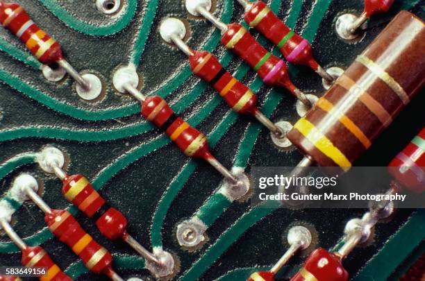 resistors on computer circuit board - resistor stock pictures, royalty-free photos & images