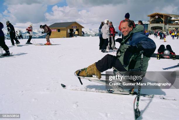 disabled skier on blackcomb mountain - trf stock pictures, royalty-free photos & images