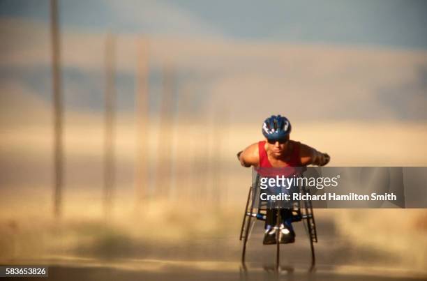 wheelchair cyclist in training - track and field vintage stock pictures, royalty-free photos & images