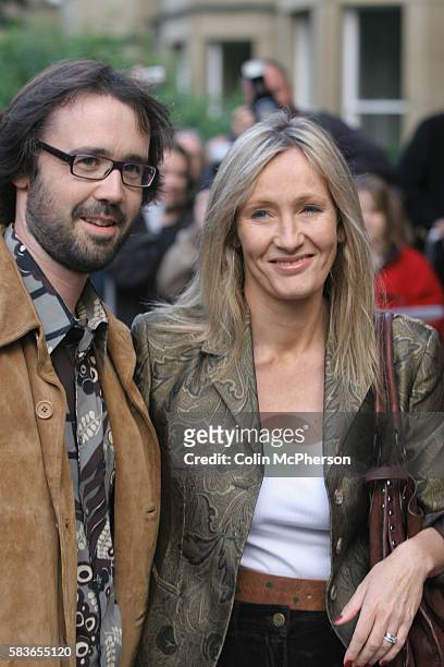 Best-selling author J K Rowling and her husband Neil Murray arrive at the premiere of Snow Cake at the Dominion Cinema in Edinburgh directed by Marc...
