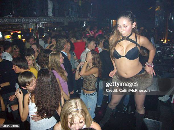Young people dancing in a music club in the centre of Kiev. Western-style bars and clubs sprang up across the city in the wake of Ukraine becoming...