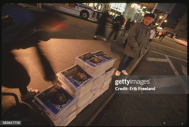 New York City: New Yorkers snatch up the first copies of this week's Village Voice.