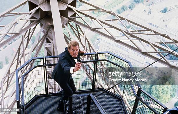 British actor Roger Moore on the set of the James Bond 007 film A View to a Kill, directed by John Glen.