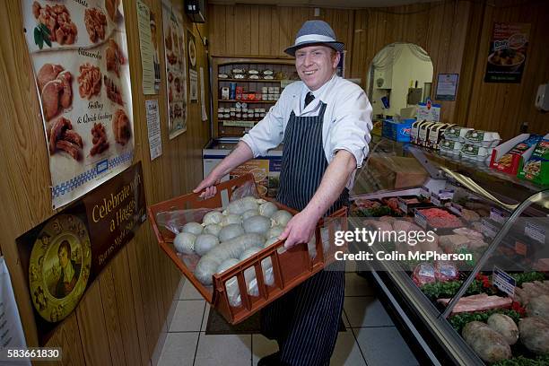 Champion haggis maker John Potter, who relocated from his native Scotland to Merseyside, with freshly-made haggis at Braveheart Butchers which he...