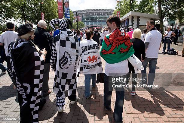 Group of Swansea City fans on Olympic Way on their way to the Npower Championship play-off final between Reading and Swansea City at Wembley Stadium....