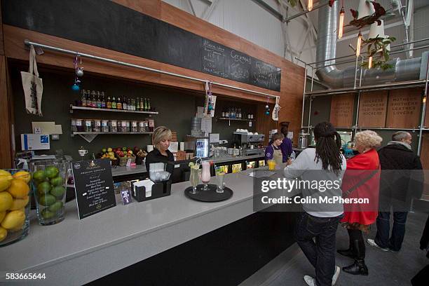 Members of staff serving drinkers in The Brink, a non-alcohol bar and restaurant in Parr Street, Liverpool. The charity-run establishment was opened...