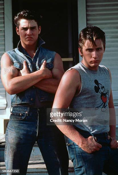 American actors Tom Cruise and Emilio Estevez on the set of The Outsiders, directed and produced by Francis Ford Coppola.