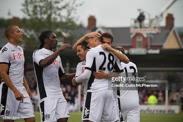 Fulham players congratulating defender Matthew Briggs after he opened the scoring against Northern Irish club Crusaders in a UEFA Europa League 2nd...