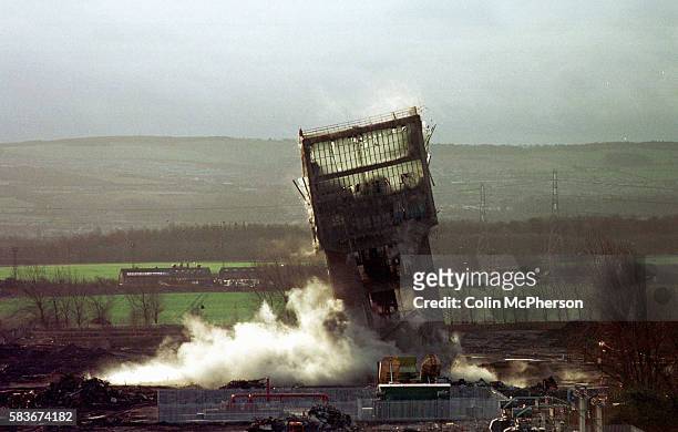 The main tower at Monktonhall coal mine in Midlothian, Scotland being destroyed by a controlled explosion shortly after mining ceased at the...