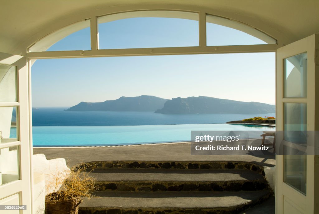 View across patio and pool towards the Aegean