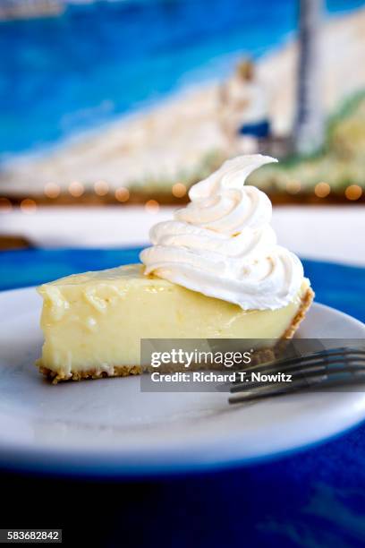 slice key lime pie at the cracked conch cafe in key west - key west stock pictures, royalty-free photos & images