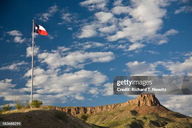 texas state flag and bluff - texas state flag stock-fotos und bilder