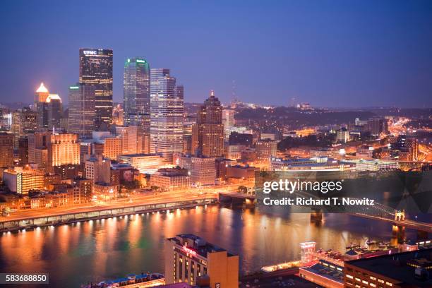 pittsburgh skyline along the allegheny river - pittsburgh city stock pictures, royalty-free photos & images