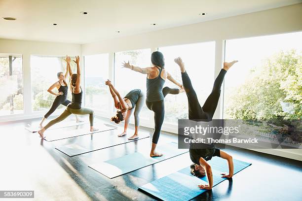 Group of women warming up before yoga class