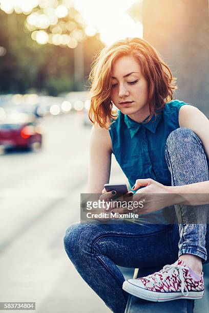 chatting on the phone and waiting - send stock pictures, royalty-free photos & images