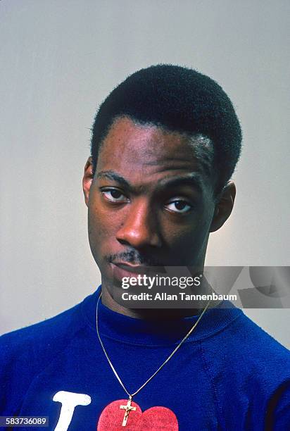 Portrait of American comedian and actor Eddie Murphy in his bedroom at his mother's house, Hempstead, Long Island, New York, January 15, 1982.