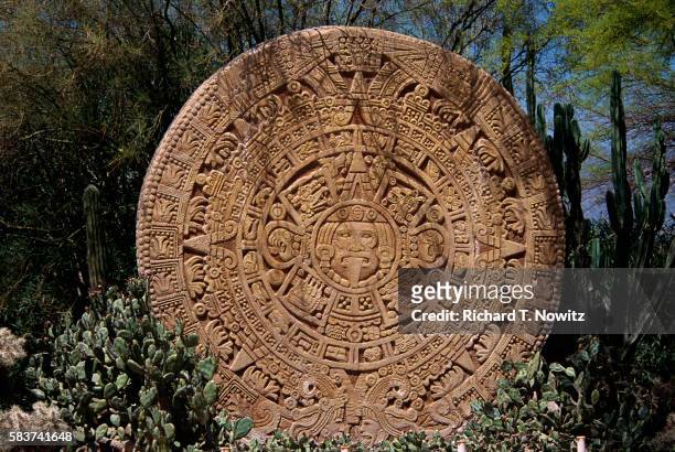 reproduction of an aztec calendar - calendario azteca fotografías e imágenes de stock