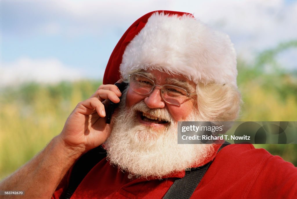 Santa Claus Talking on a Cell Phone