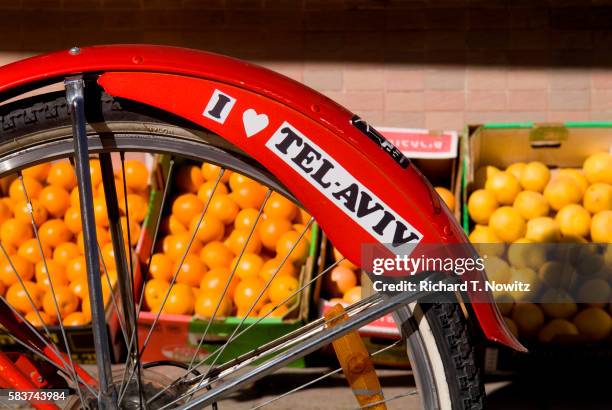 bicycle on rothchild boulevard with "i love tel aviv" sticker - bumper sticker stock pictures, royalty-free photos & images