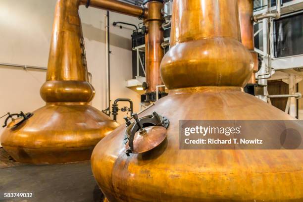 whiskey still at glenglassaugh distillery - scotch whisky stock pictures, royalty-free photos & images