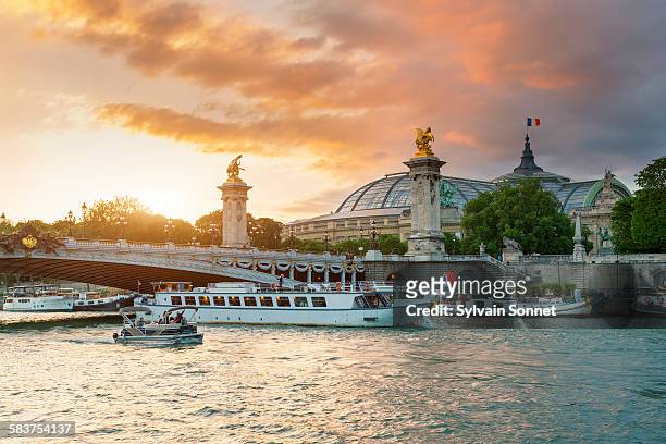 paris, pont alexandre iii at sunset - seine maritime stock pictures, royalty-free photos & images