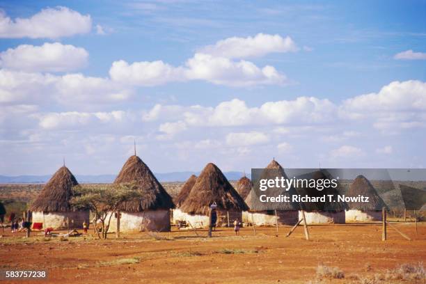 clouds over laikipia masai rondavels - samburu-national-park stockfoto's en -beelden
