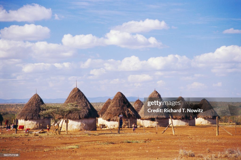 Clouds Over Laikipia Masai Rondavels