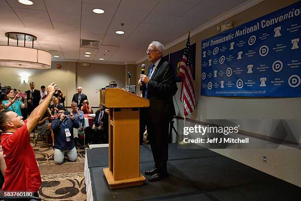 Senator Bernie Sanders exits the stage after addressing the New Hampshire, Maine and Vermont delegation breakfast at the Democratic National...