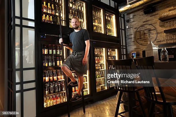 Owner Joshua Mott hangs out by his cider fridge. Her Father's Cider Bar + Kitchen, with owner Joshua Mott has been open for 5 weeks on Harbord near...