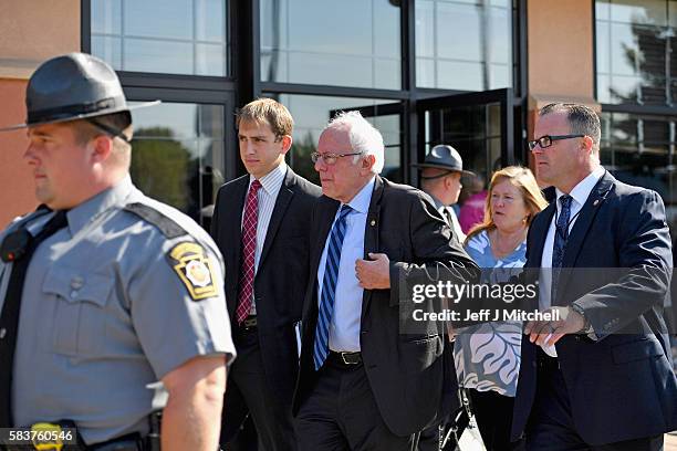 Senator Bernie Sanders exits after addressing the New Hampshire, Maine and Vermont delegation breakfast at the Democratic National Convention on July...