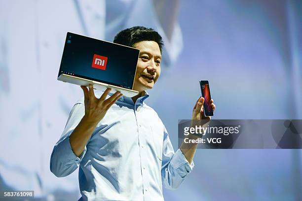 Xiaomi's CEO Lei Jun introduces Mi Notebook Air and Redmi Pro phone on a new products launch event as Xiaomi unveils latest dual-camera wielding...