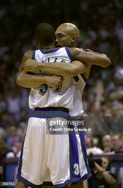 Darvin Ham hugs Ray Allen of the Milwaukee Bucks after winning game six of the eastern conference finals against the Philadelphia 76ers at the...