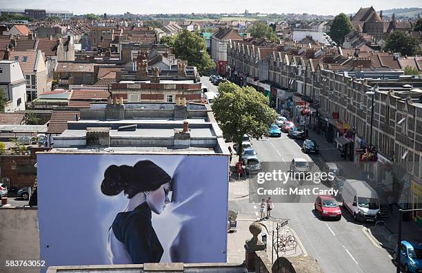 Artwork by Jody adorns the side of a building and is part of the 2016 Upfest on July 27, 2016 in Bristol, England. The annual event, which this year...