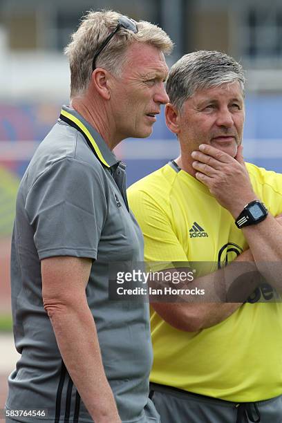 Sunderland manager David Moyes chats with coach Paul Bracewell during the pre-season friendly match between Dijon FCO and Sunderland AFC at Stade...