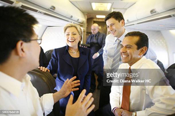 New York Senator and US Democratic presidential hopeful Hillary Rodham Clinton on a plane with California Controller John Chiang, California State...