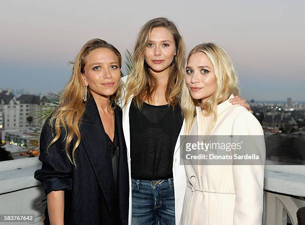 Designer Mary-Kate Olsen, actress Elizabeth Olsen and designer Ashley Olsen attend Elizabeth and James Flagship Store Opening Celebration with...