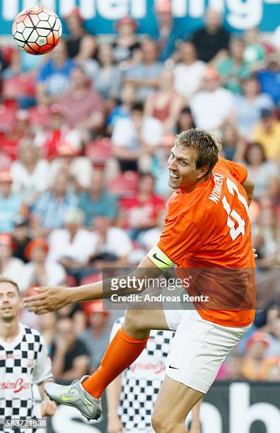 Dirk Nowitzki jumps for a header during the 'Champions for charity' football match between Nowitzki All Stars and Nazionale Piloti in honor of...