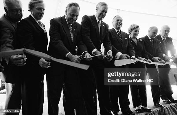 Hillary Clinton cuts an inauguration ribbon at the N.Y. State Center of Excellence in Bioinformaatics and Life Sciences at the University at Buffalo...