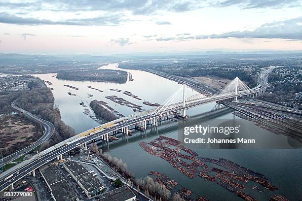 hanging bridge in modern urban environment - autostrada transcanadese foto e immagini stock