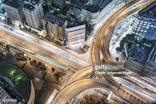 elevated view of city at night, kanto region, shinjuku, tokyo, japan - elevated road stock pictures, royalty-free photos & images
