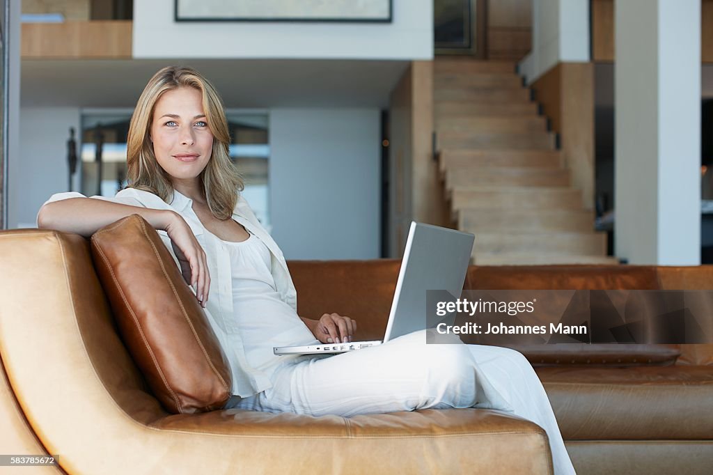 Woman using laptop computer