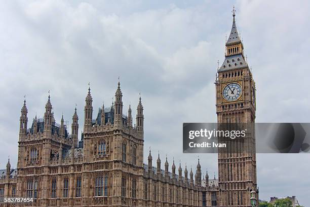 big ben at westminster with the houses of parliament, portcullis house - big ben london eye dusk stockfoto's en -beelden