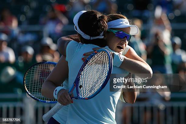 Abigail Spears and Raquel Atawo of the United States celebrate after winning the doubles final against Darija Jurak of Croatia and Anastasia...