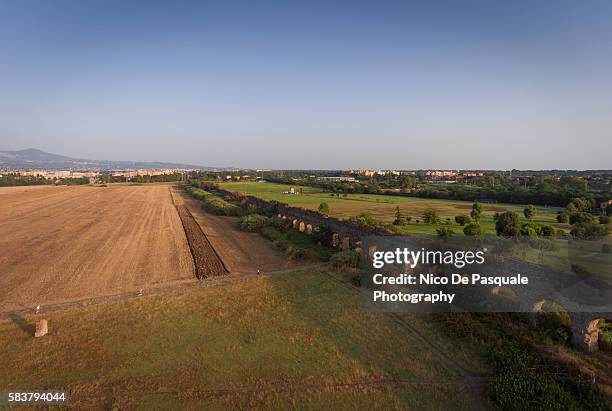 runners at the appian way - appian way stock pictures, royalty-free photos & images