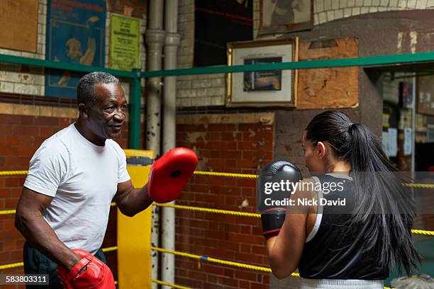 boxing club - motivation coach stock pictures, royalty-free photos & images